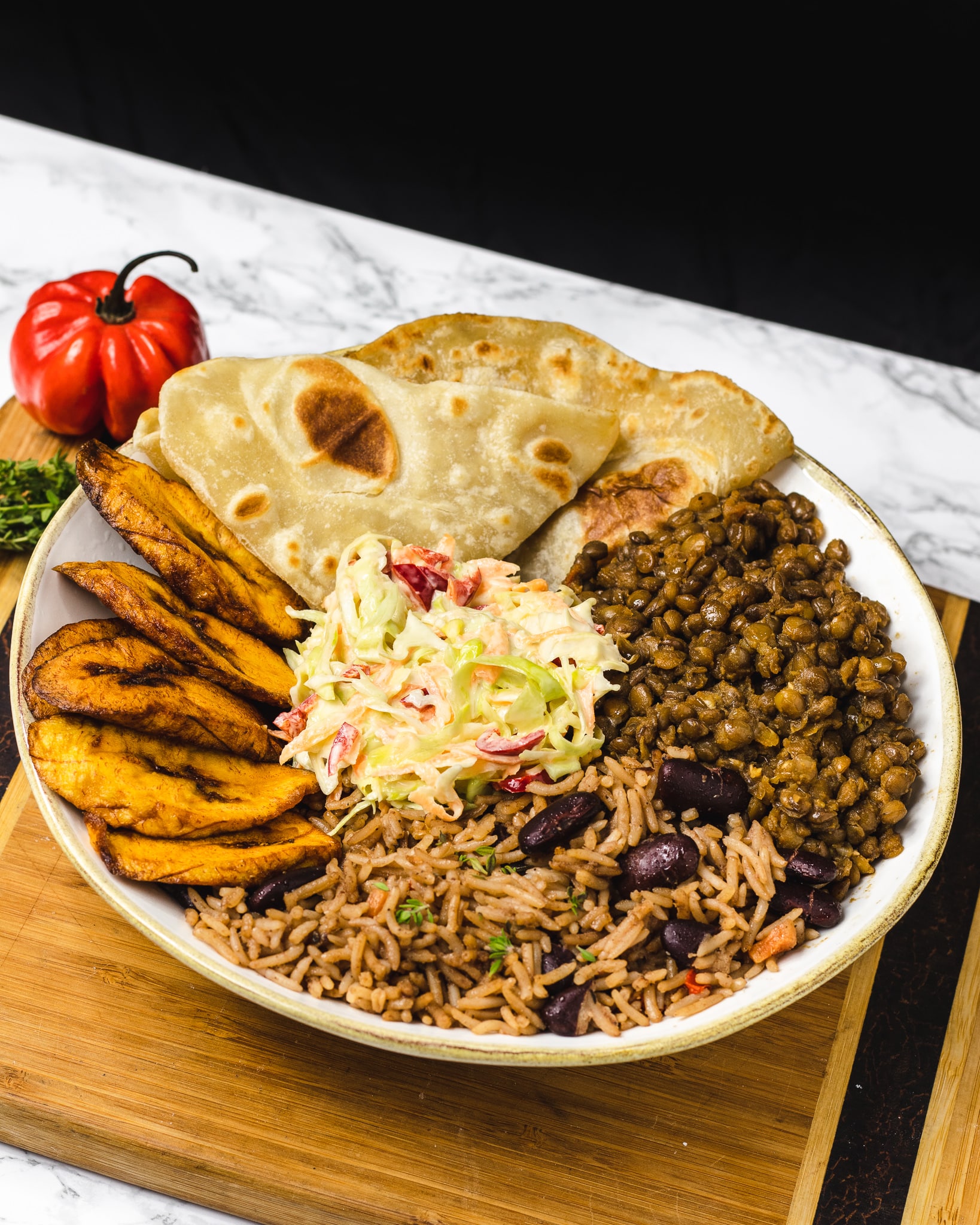 Lentils rice and peas coleslaw and roti - Jollof Rice-African and Caribbean Wedding Caterer